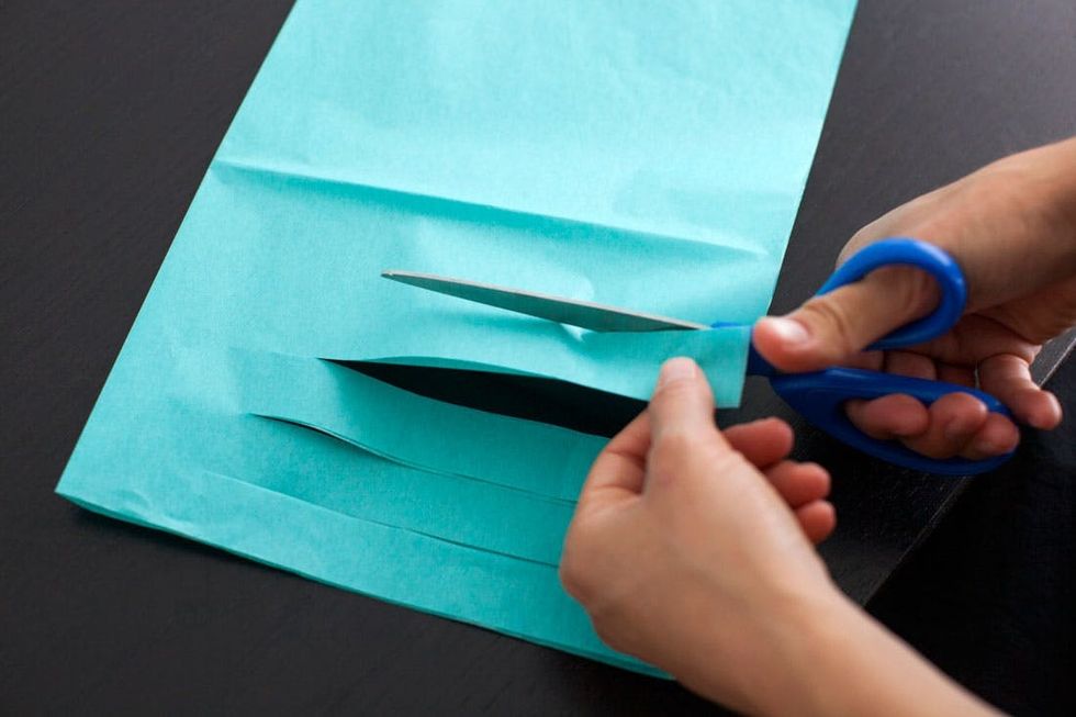 How to Make a Festive Fringe Photo Backdrop Brit + Co