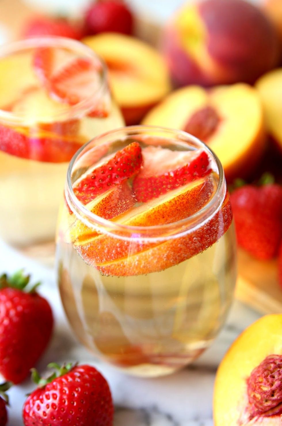 10 Peach Cocktail Recipes Your Guest Will Love Brit + Co Brit + Co