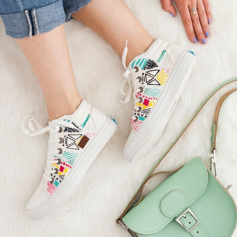 white sneakers with embroidery