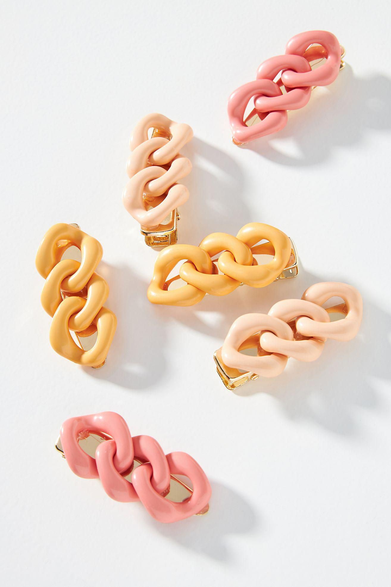 pink, tan, and yellow chunky chain hair clips