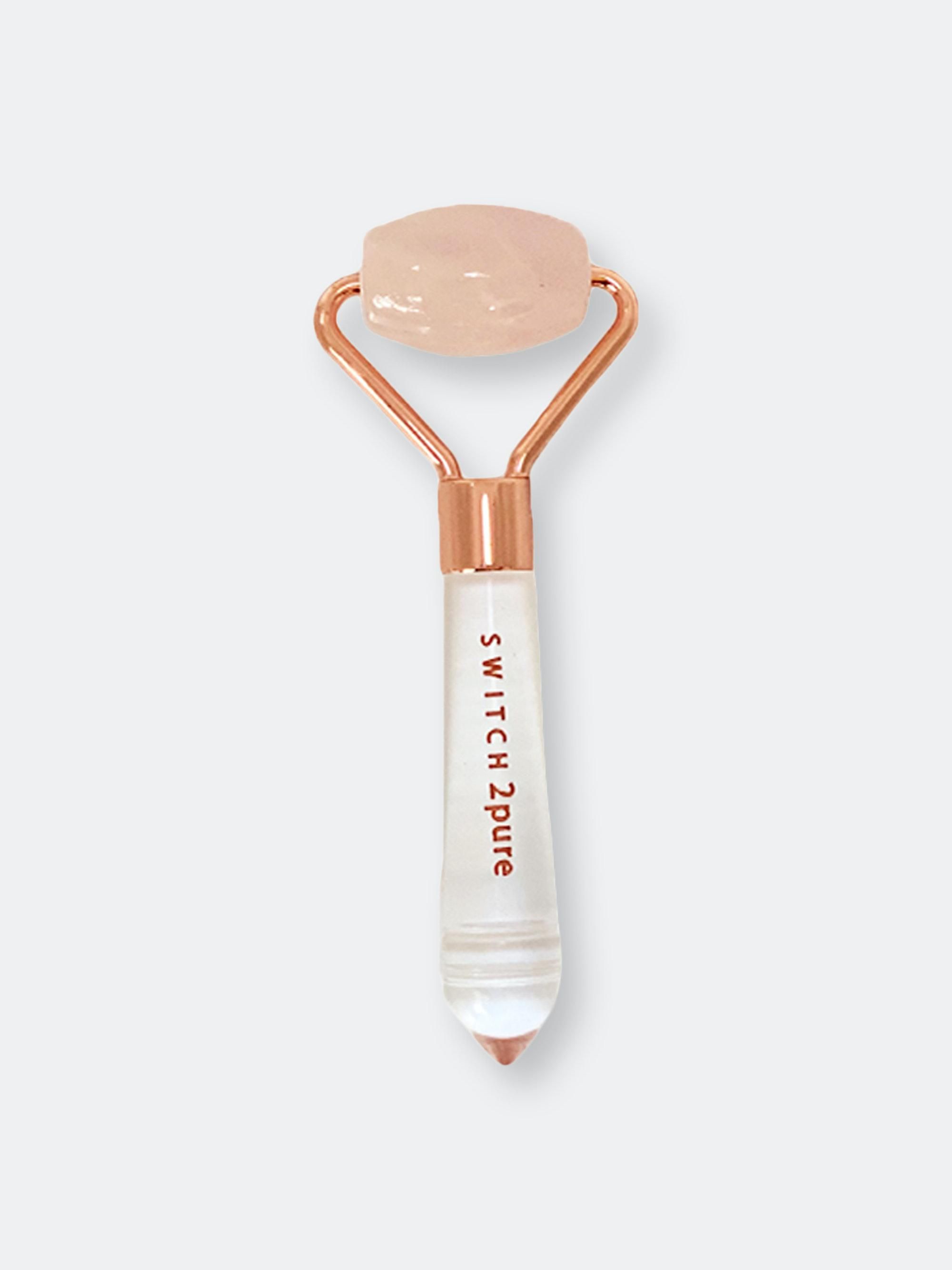 This mini white facial roller promotes lymphatic drainage you can take anywhere.