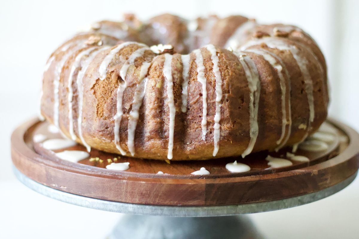 Fall Cider Pumpkin Pecan Cake on a cake stand