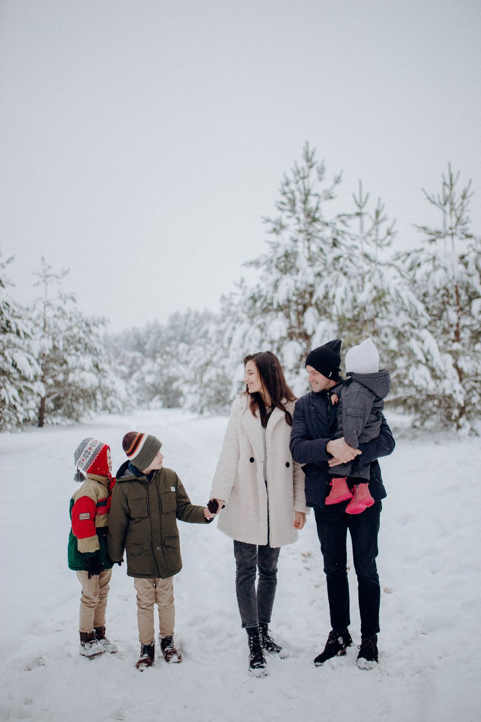 family enjoying snow