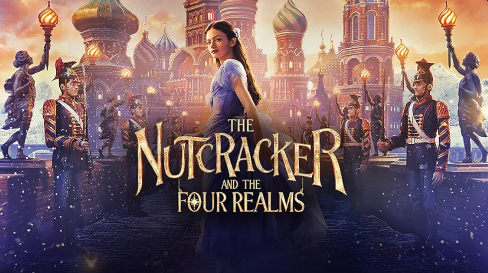 Fantasy woman in a castle with soldiers; "The Nutcracker and the Four Realms" title displayed.