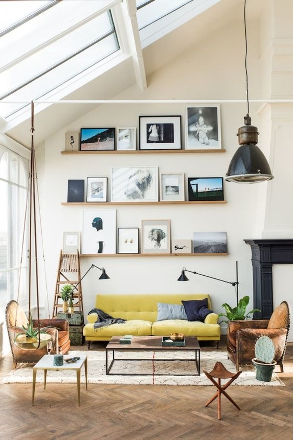 floating shelves in living room to hang art prints