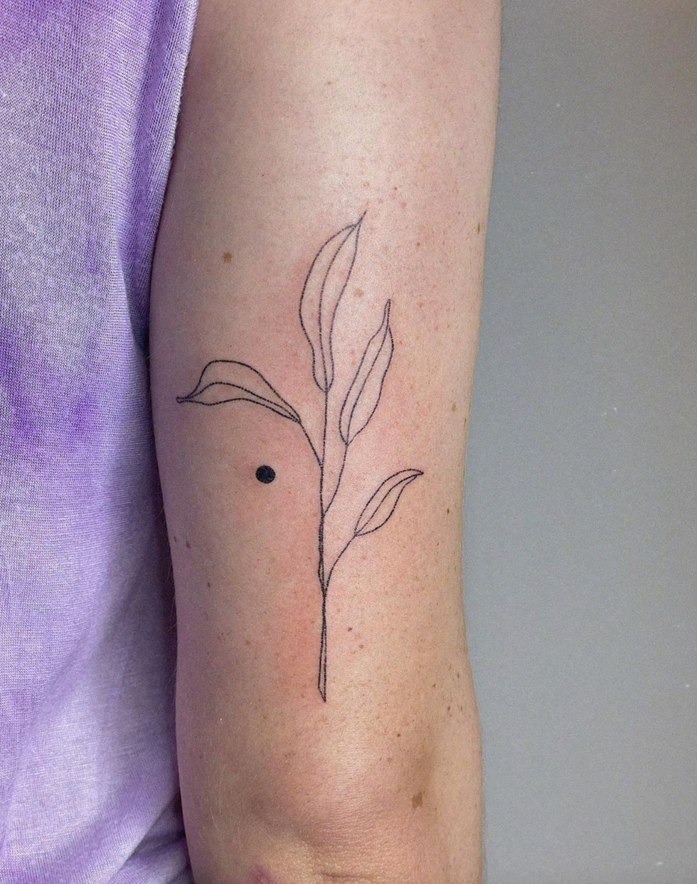 Foliage stick and poke tattoo