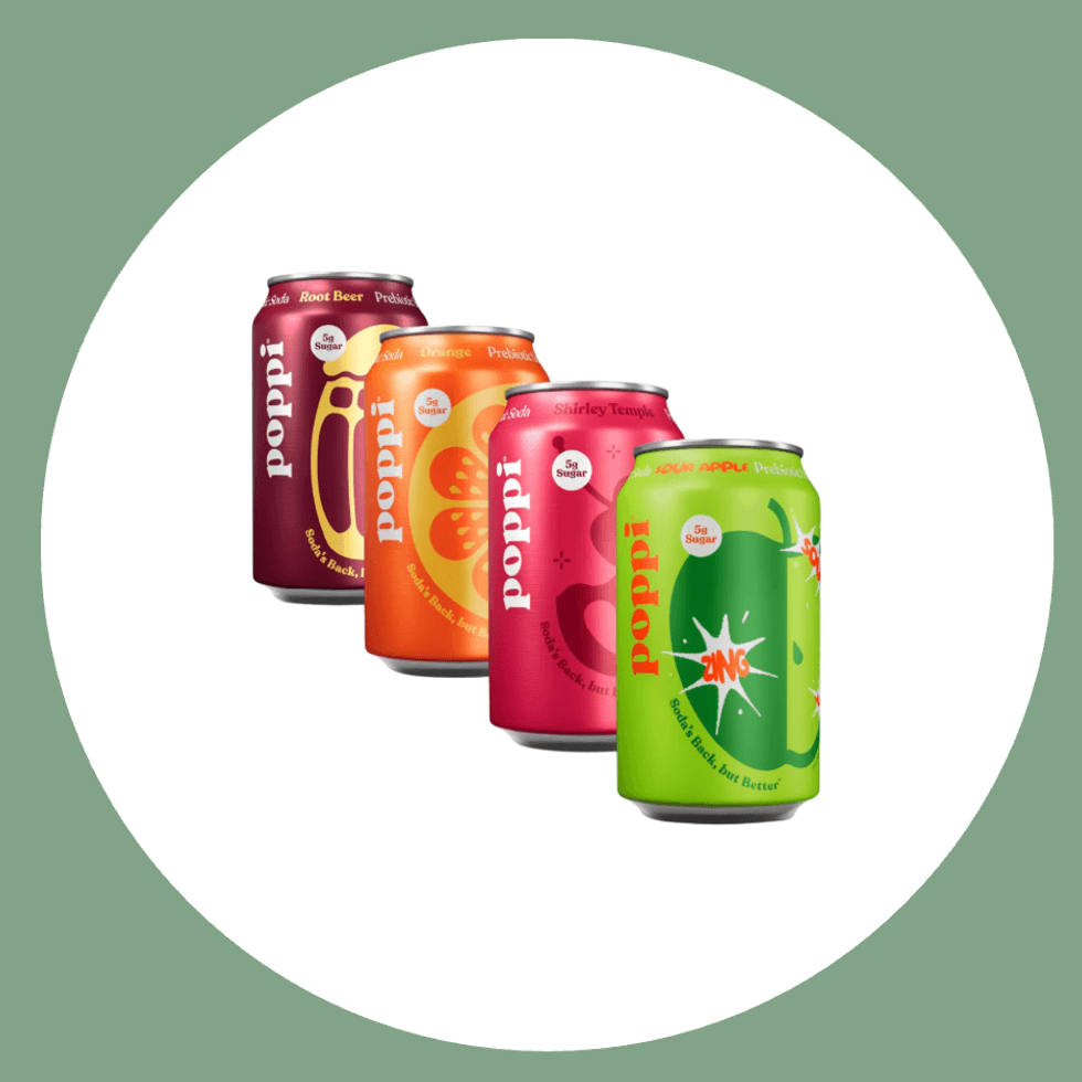 Four colorful Poppi soda cans in a row, flavors: root beer, orange, shirley temple, apple.