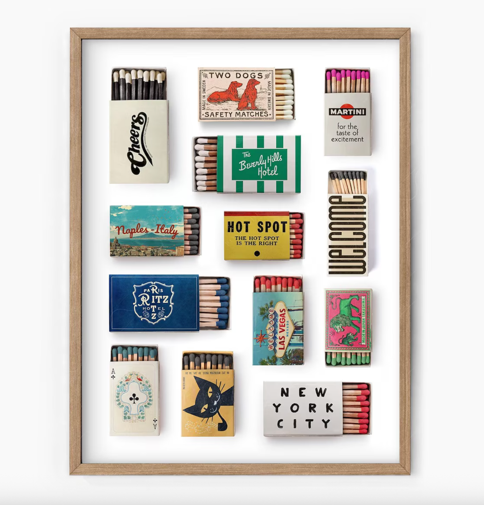 Framed vintage matchbook collection with various designs and city names.