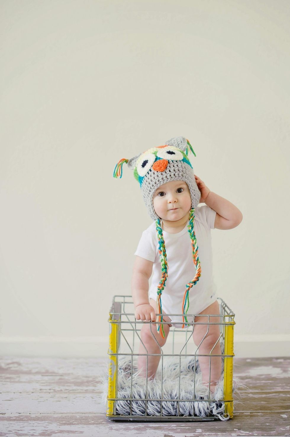 french baby names boy standing in a basket