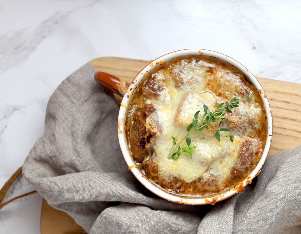 French onion soup on cutting board