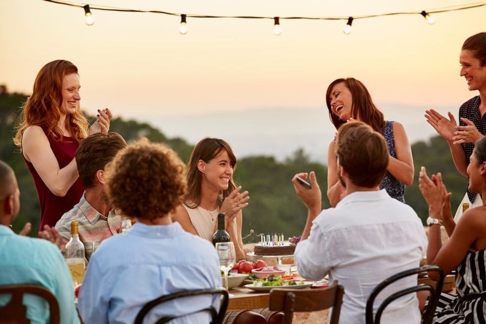 Friends enjoy a birthday picnic