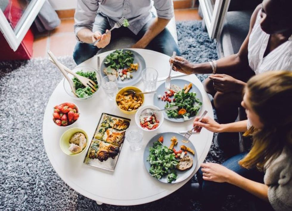 Friends enjoying lunch at home