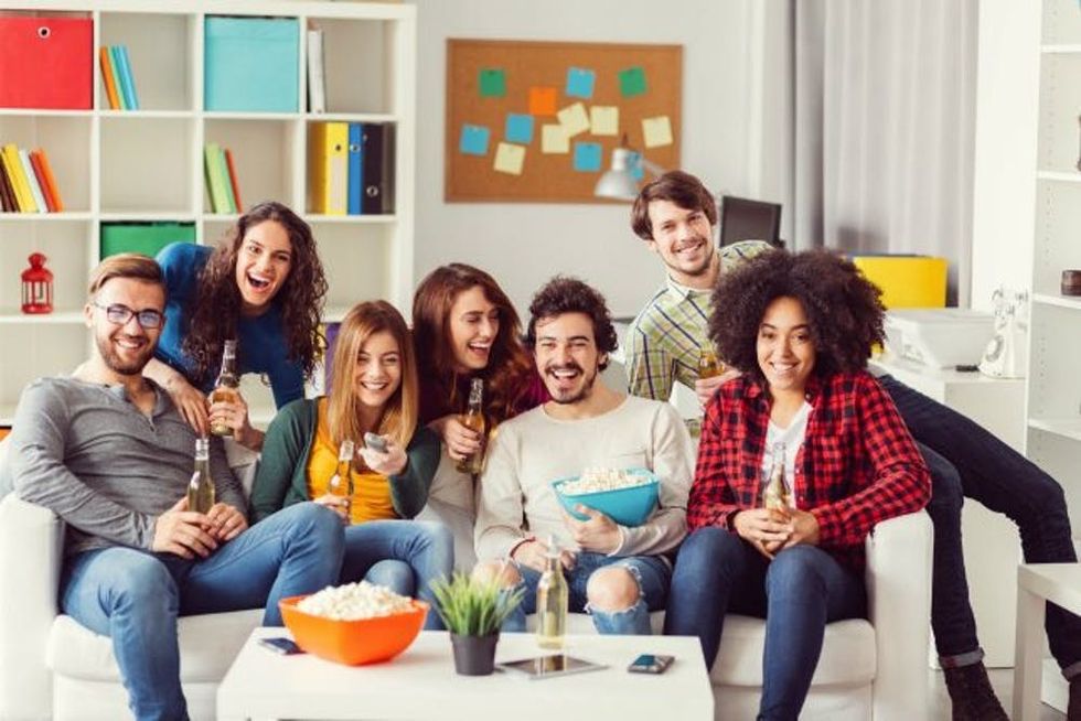 friends watching TV popcorn header