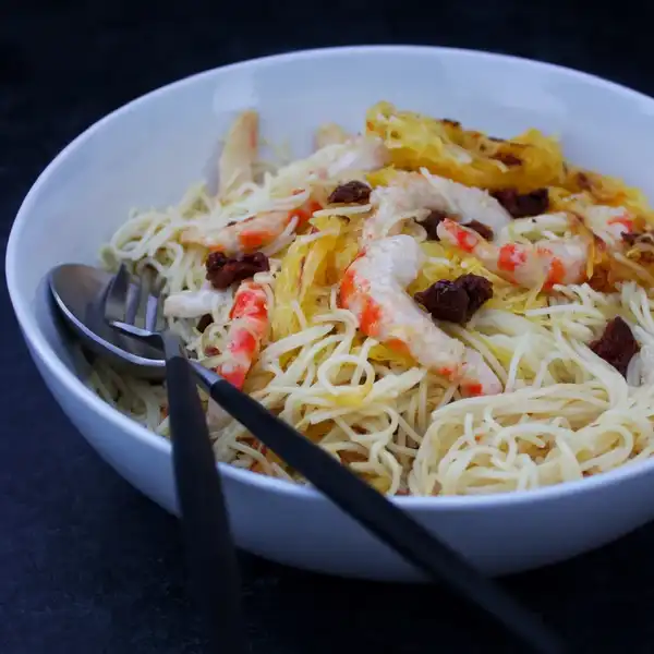 garlic butter shrimp angel hair pasta and spaghetti squash with sun dried tomatoes