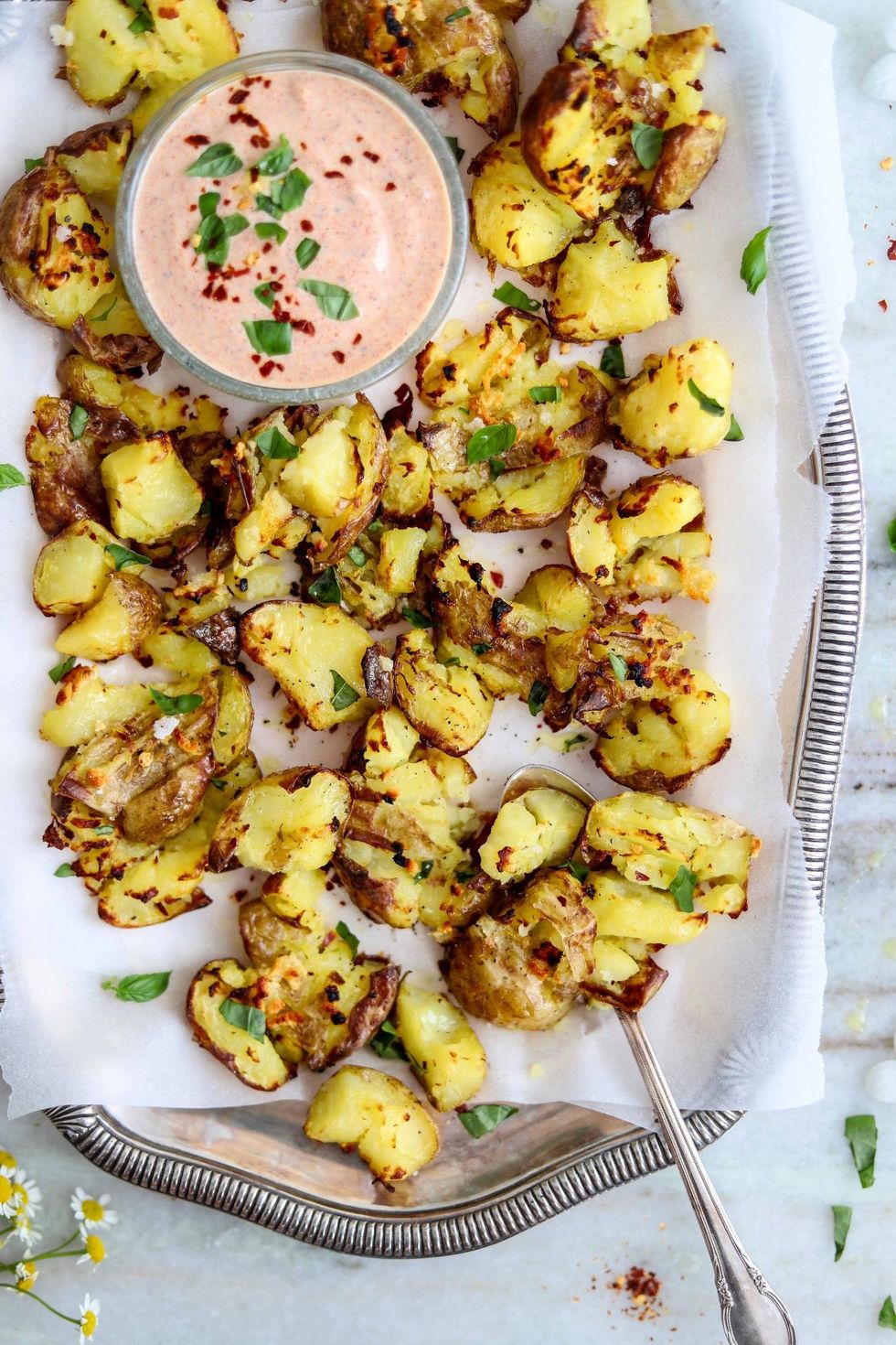 Garlicky Smashed Potatoes with Harissa Yogurt