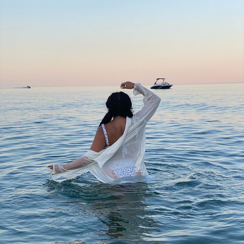 girl in the ocean at the beach