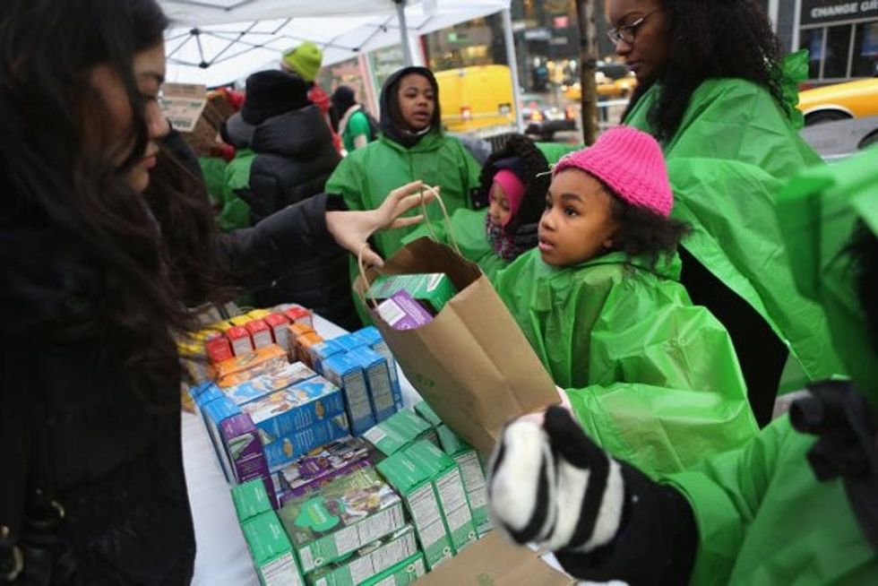Girl Scouts selling cookies