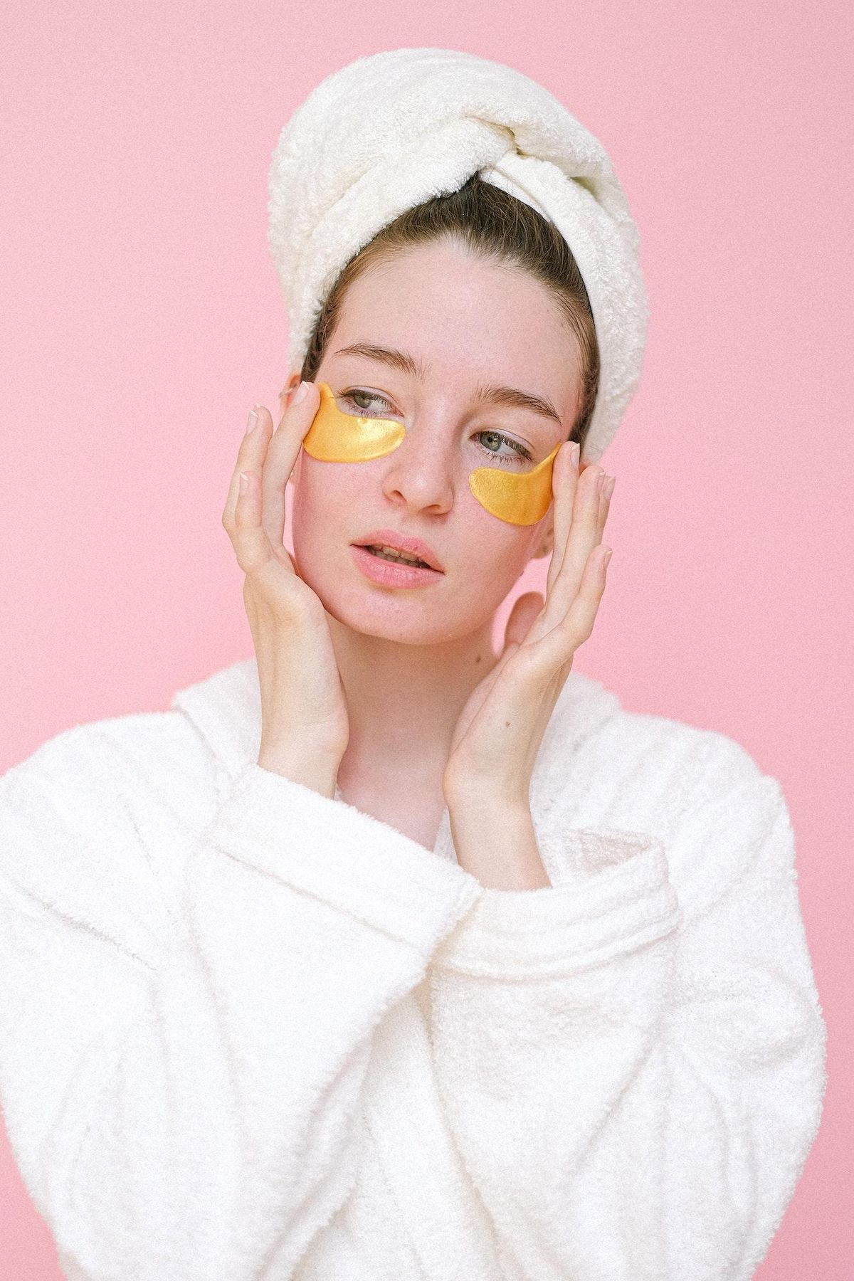 girl with gold eye mask on skin cycling