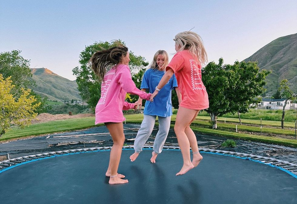 girls jumping on the trampoline
