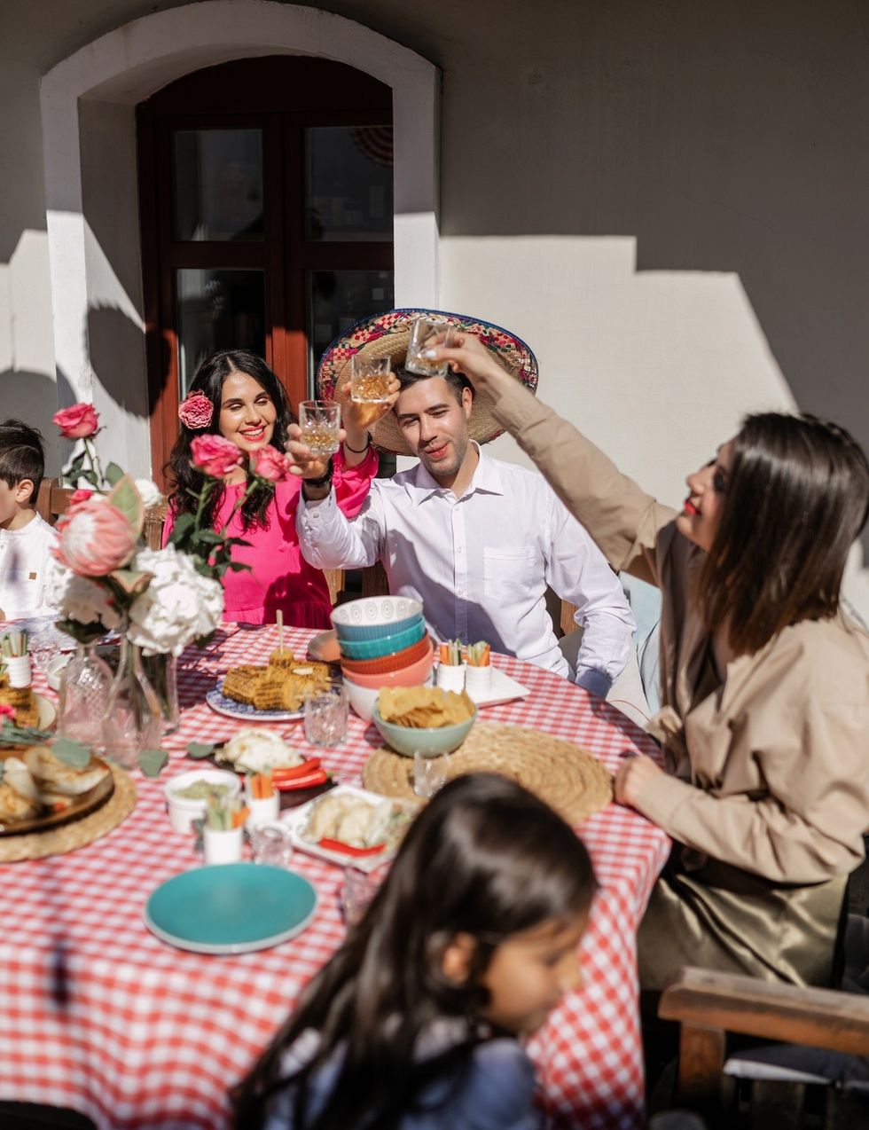 giving a celebratory toast