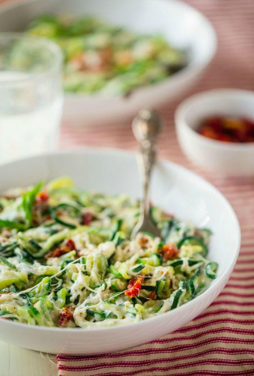 Gluten Free Zucchini Noodles mac cheese in a white bowl with a fork