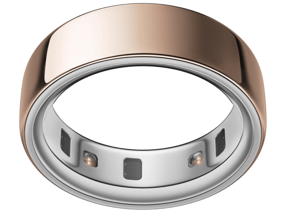 Gold and silver smart ring with sensors inside.