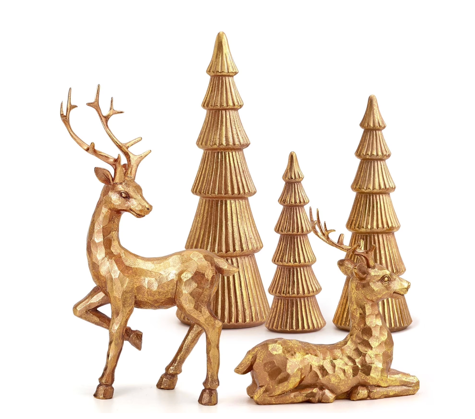 Gold deer and tree sculptures with geometric patterns on a white background.