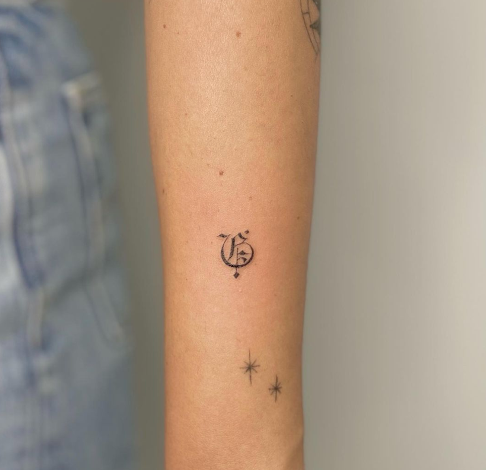 Gothic letter tattoo