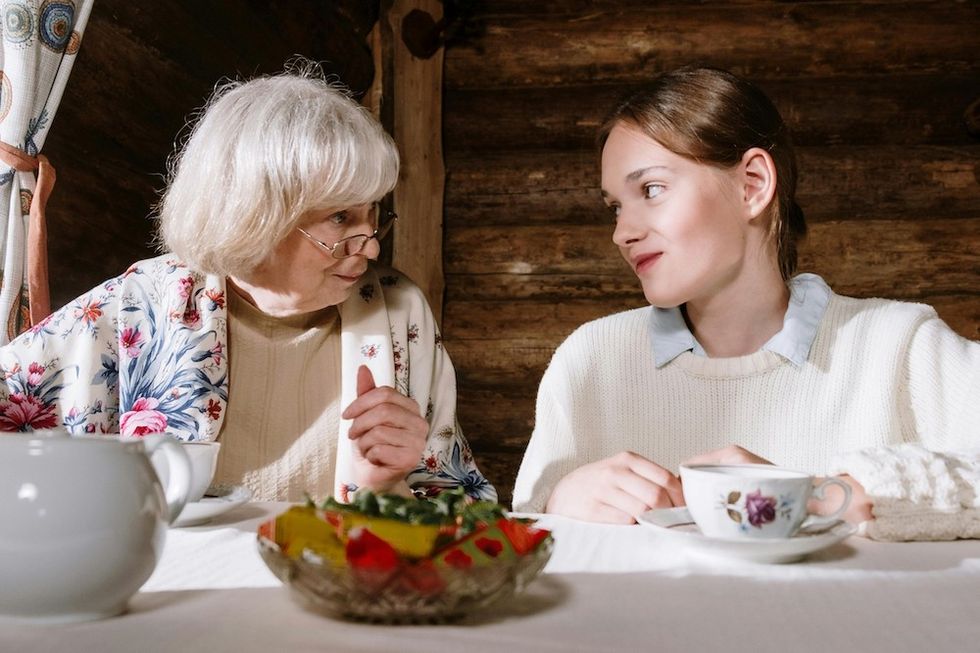grandmother and her granddaughter looking at each other