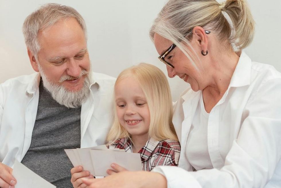 grandparents with their grandchild
