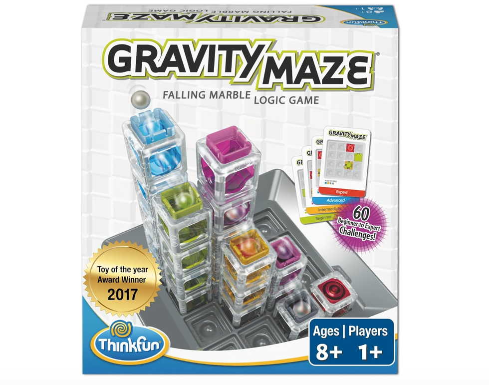 Gravity Maze marble logic game box with colorful towers and challenge cards.