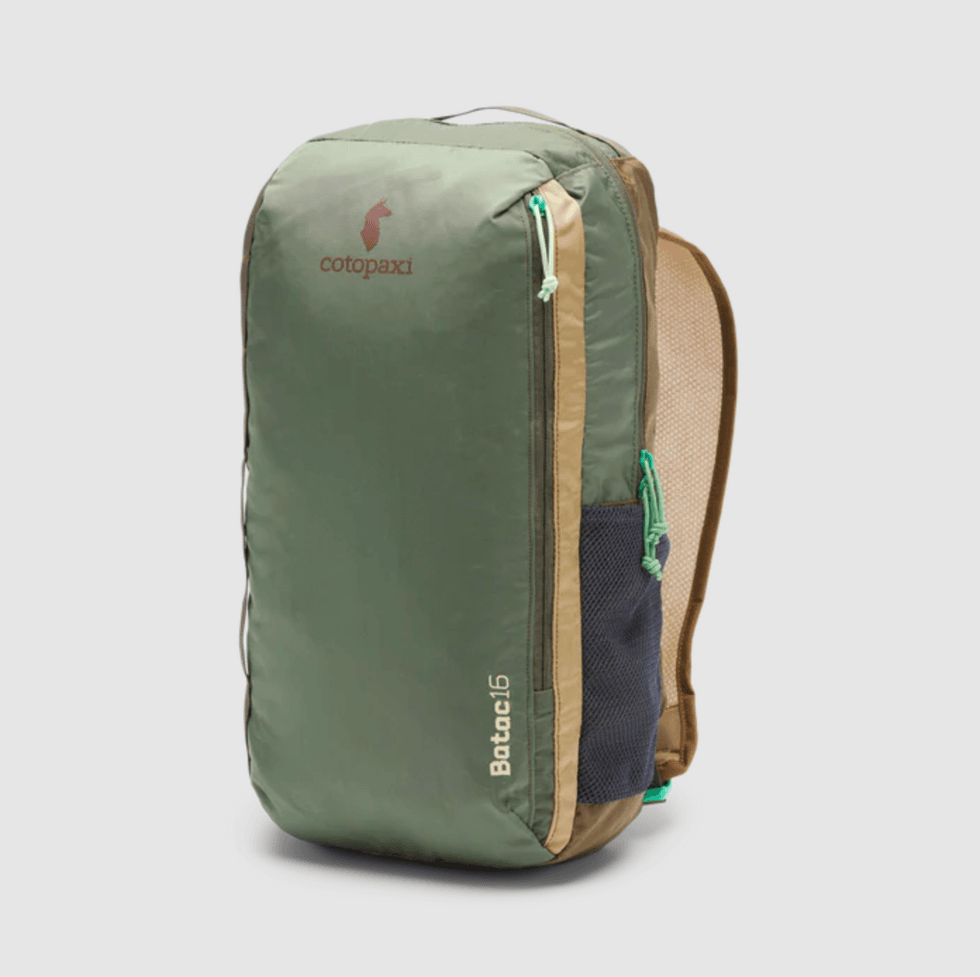 Green and tan Cotopaxi Batac 16L daypack with side mesh pocket and front zipper.
