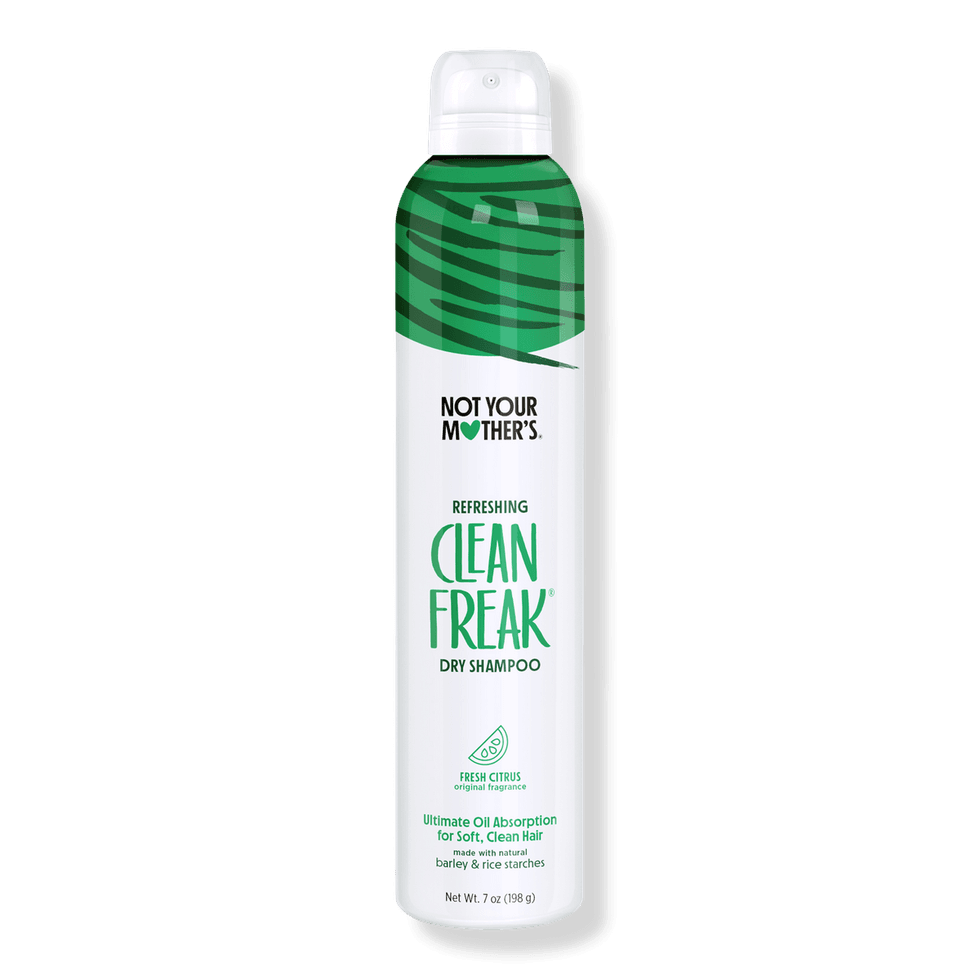 Green and white can of Not Your Mother's Clean Freak dry shampoo, fresh citrus scent.