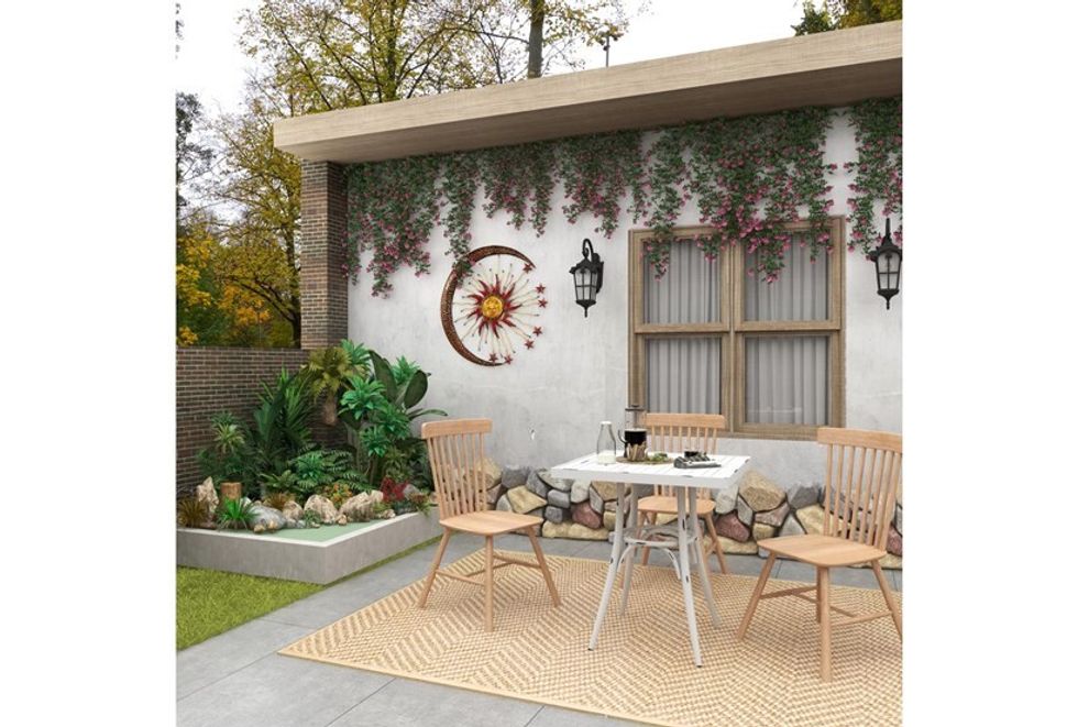 grey metal sun and moon wall decor