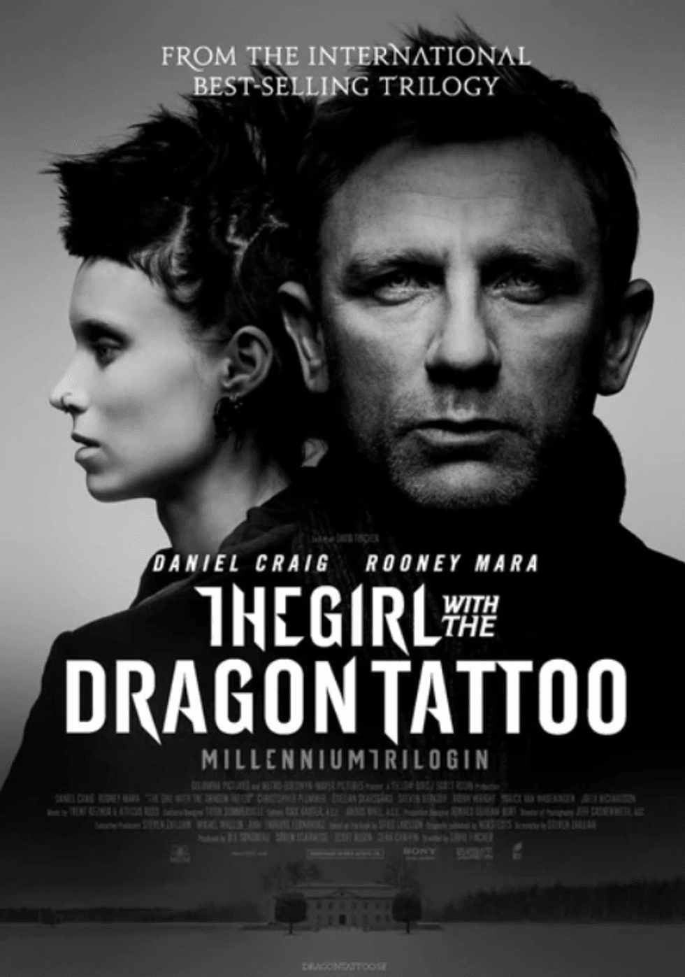 Greyscale "The Girl with the Dragon Tattoo" movie poster featuring two serious faces.