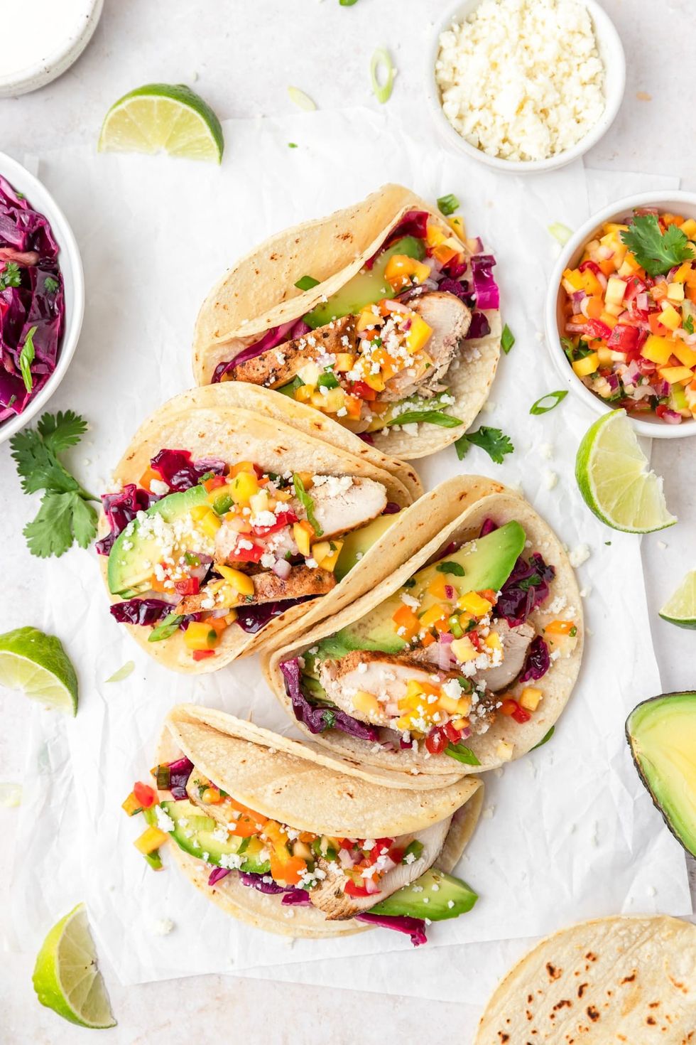 Grilled Chicken Tacos with Mango Salsa and cabbage