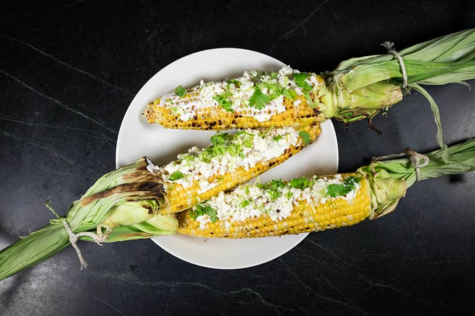 grilled corn with cilantro and queso fresco