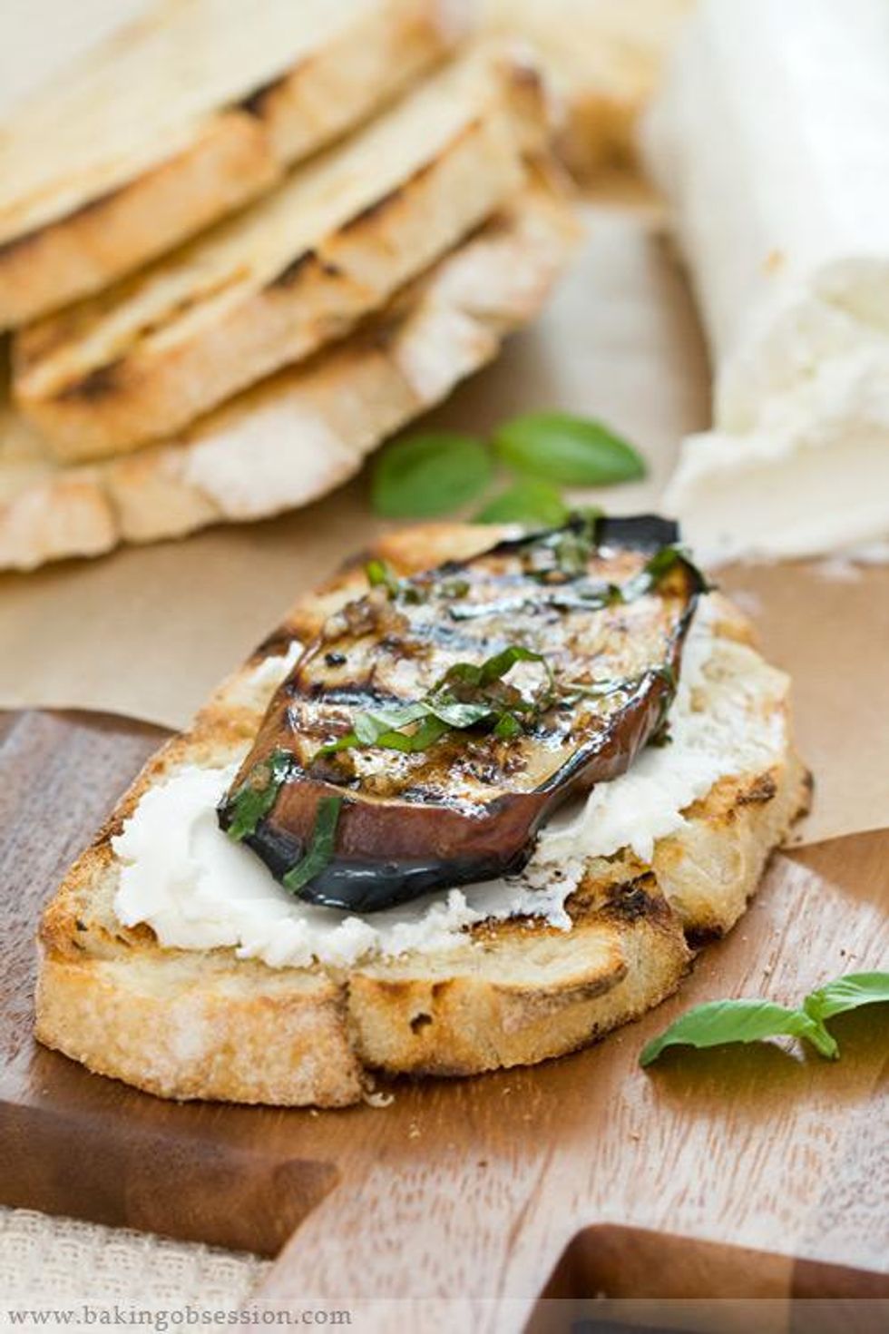 grilled eggplant and cheese on crostini