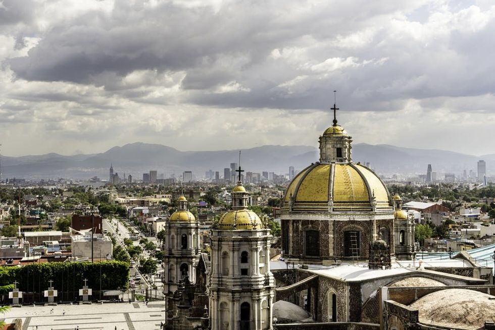 Guadalupe Basilica church and Mexico City skyline from Tepeyac Hill where Juan Diego first saw the Virgin of Guadalupe.