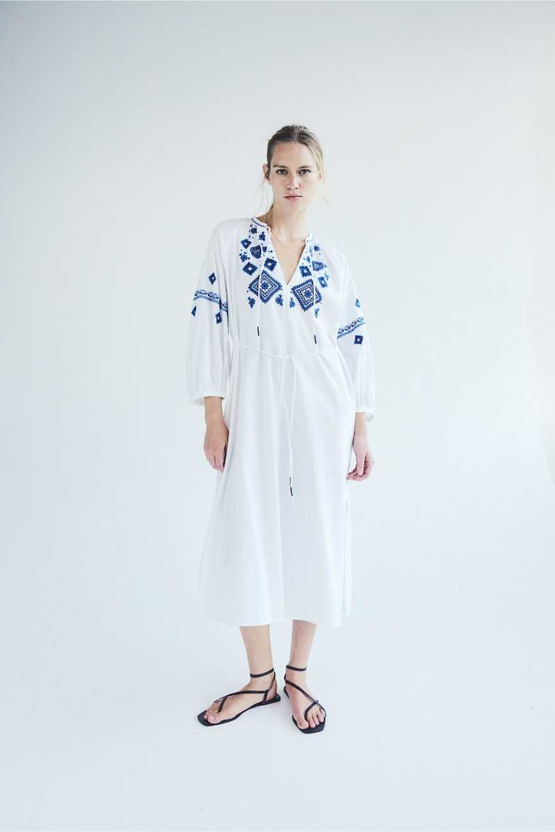 h and m blue and white dress H&M Gathered seam at the waist and a flared skirt Ladies - White/Blue floral Smocked-bodice