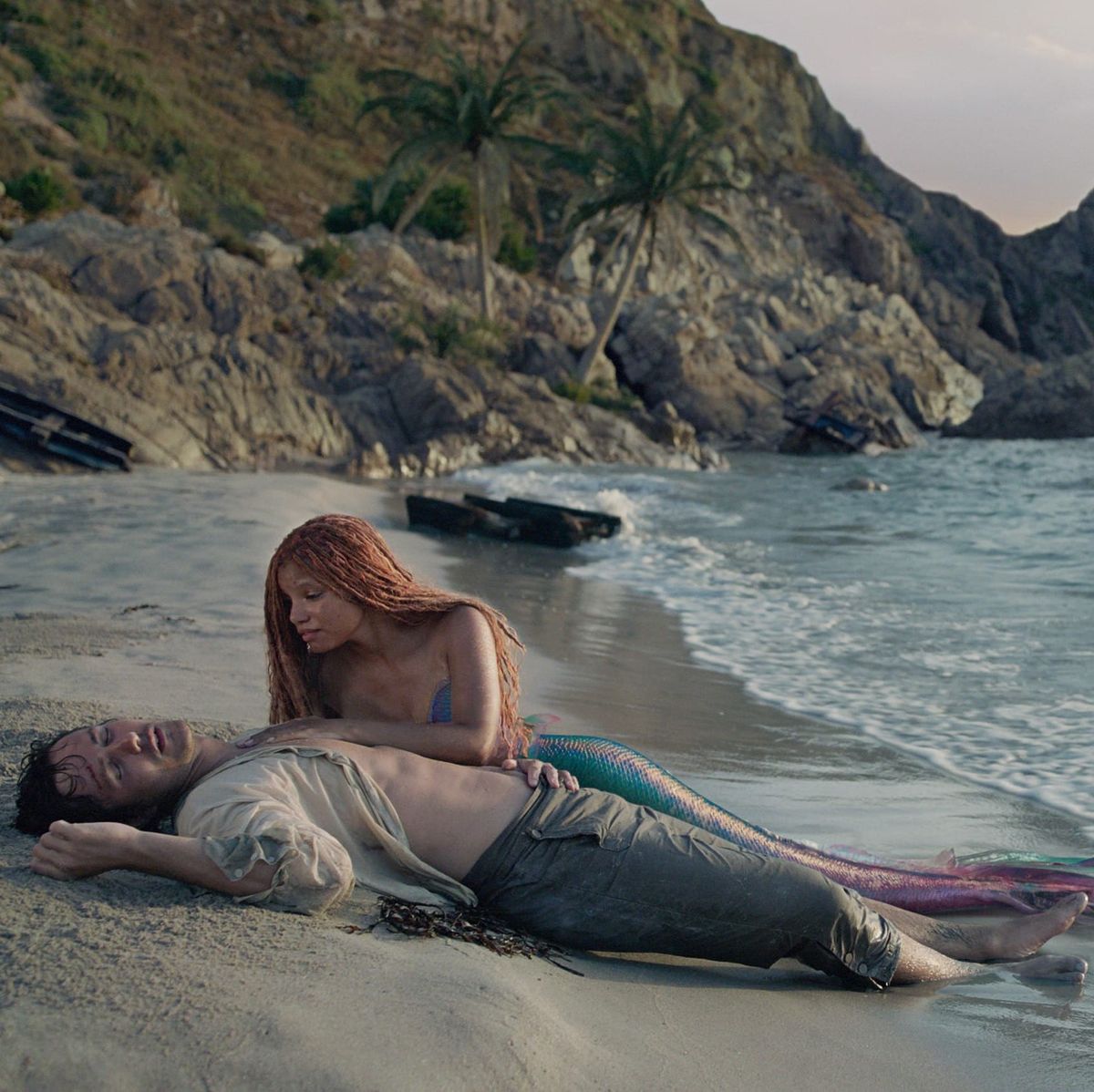 Halle Bailey as ariel and Jonah Hauer-King as eric in the little mermaid