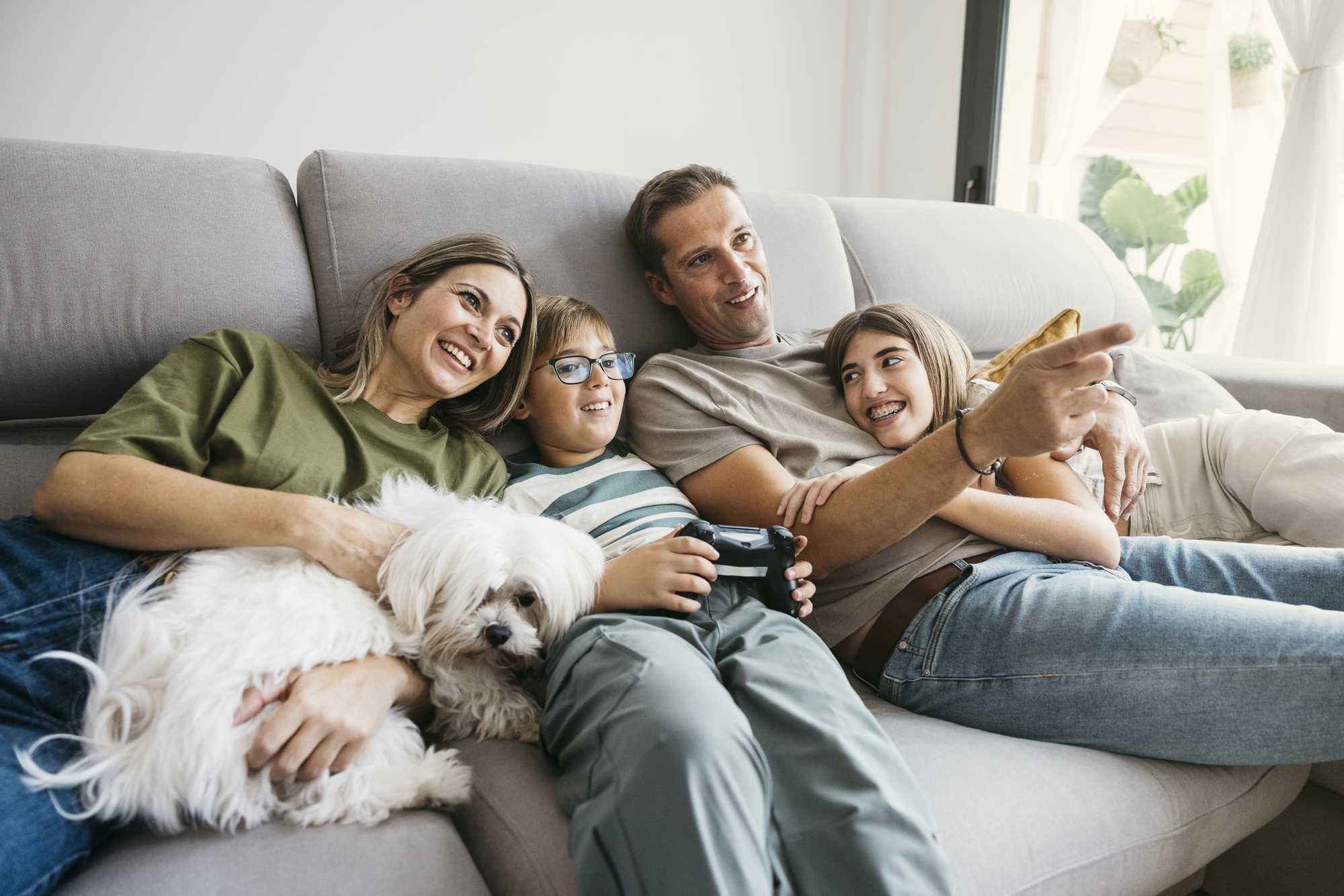 happy family on couch | duckbill for managing life tasks