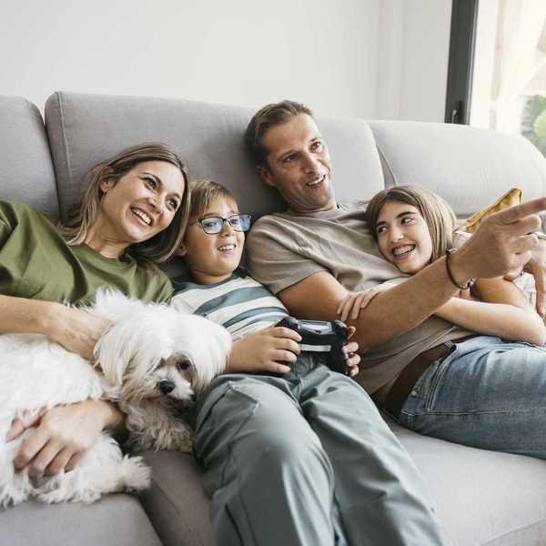 happy family on couch | duckbill for managing life tasks