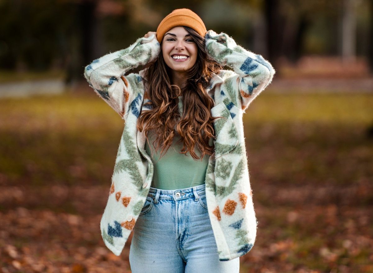 happy-woman-wearing-a-cute-fall-sweater