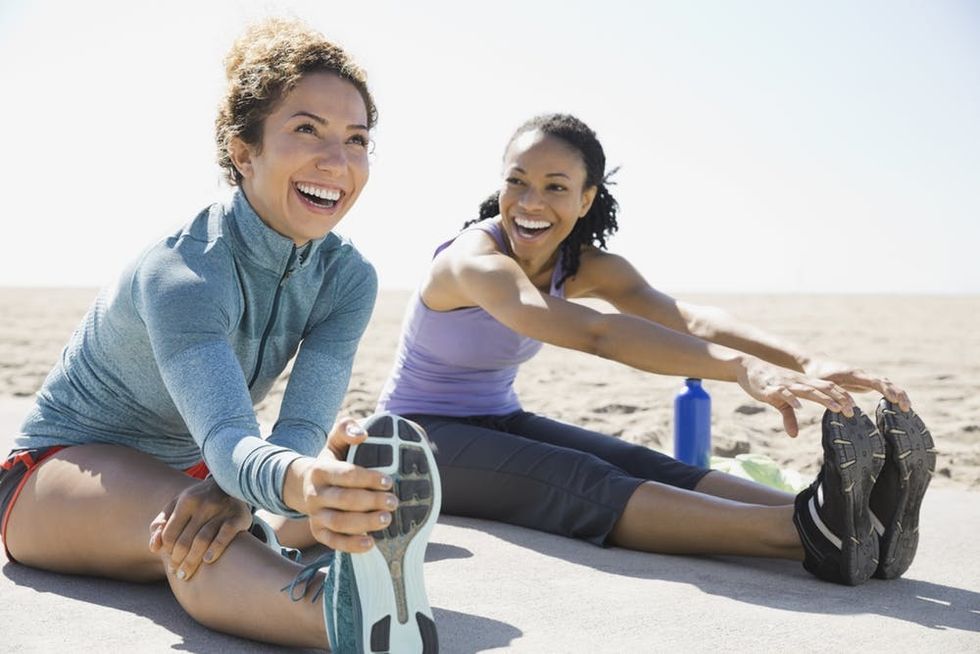 Happy women exercising