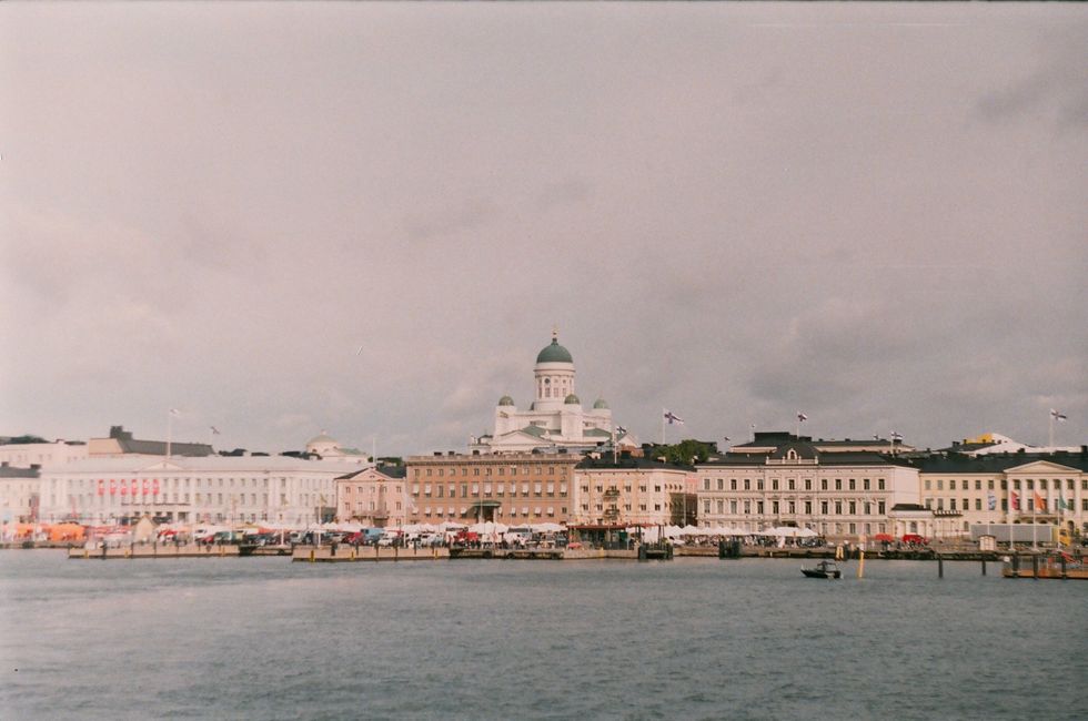 Helsinki, Finland cathedral along the water The Happiest Cities In The World