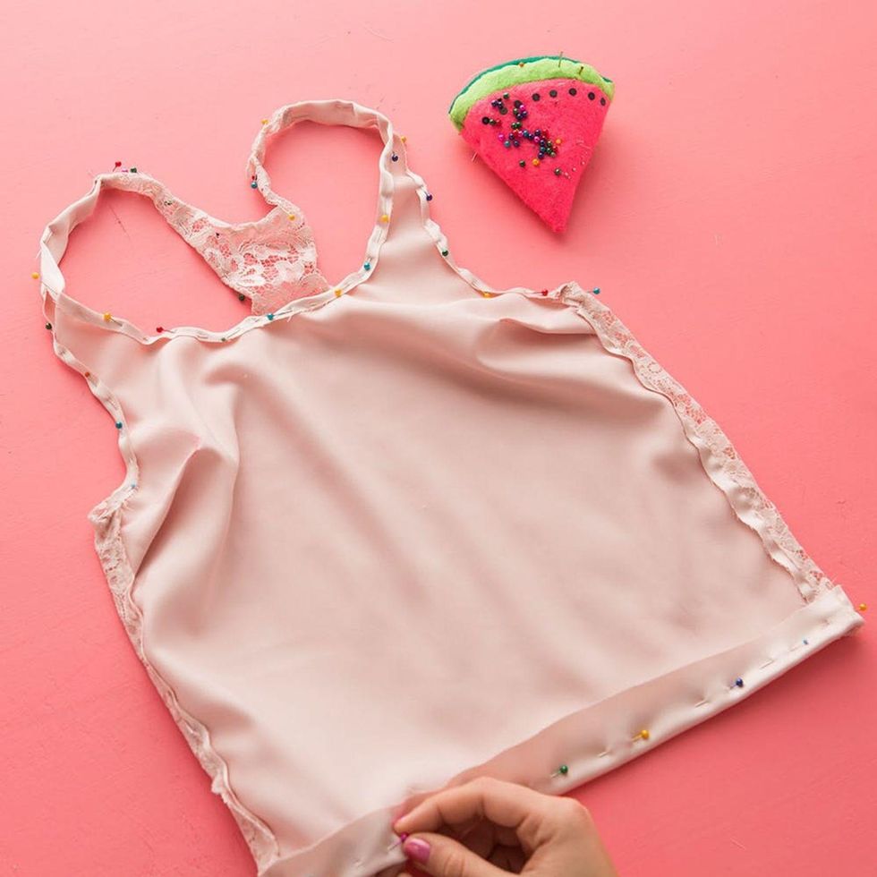 hem the edges of the tank with pins