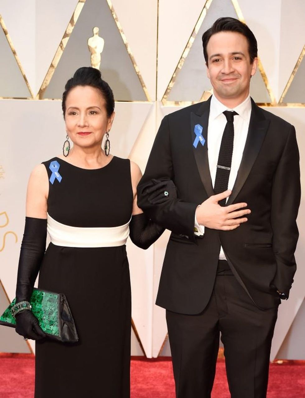 HOLLYWOOD, CA - FEBRUARY 26: Actor Lin-Manuel Miranda (R) and Luz Towns-Miranda attend the 89th Annual Academy Awards at Hollywood & Highland Center on February 26, 2017 in Hollywood, California. (Photo by Kevin Mazur/Getty Images)