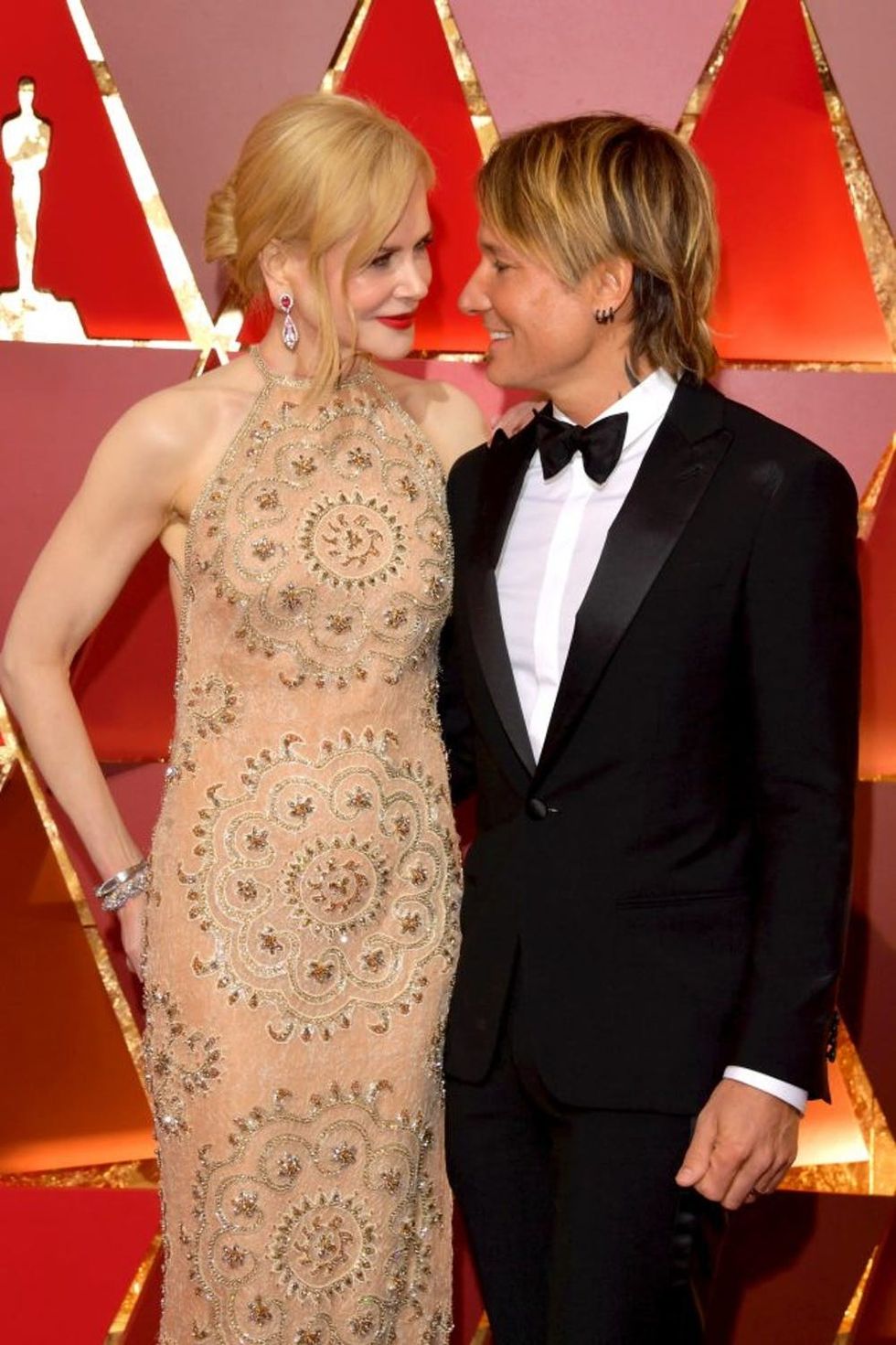 HOLLYWOOD, CA - FEBRUARY 26: Actor Nicole Kidman (R) and singer Keith Urban attend the 89th Annual Academy Awards at Hollywood & Highland Center on February 26, 2017 in Hollywood, California. (Photo by Lester Cohen/WireImage)