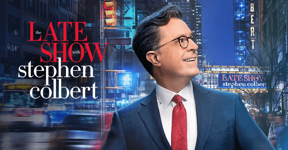 Host in suit with city backdrop and "The Late Show with Stephen Colbert" text.